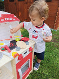 8 piece Red wooden play kitchen.